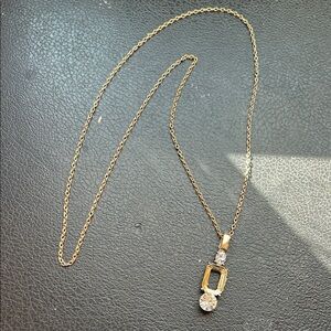 Elegant Gold and Silver Pendant Necklace